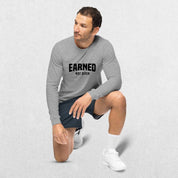 Model Wearing Athletic Heather GPW Unisex Athletic Long Sleeve Tee - Earned Not Given in a studio background