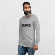 Model wearing the Athletic heather GPW Unisex Long Sleeve Tee with Unstoppable Design with jeans.