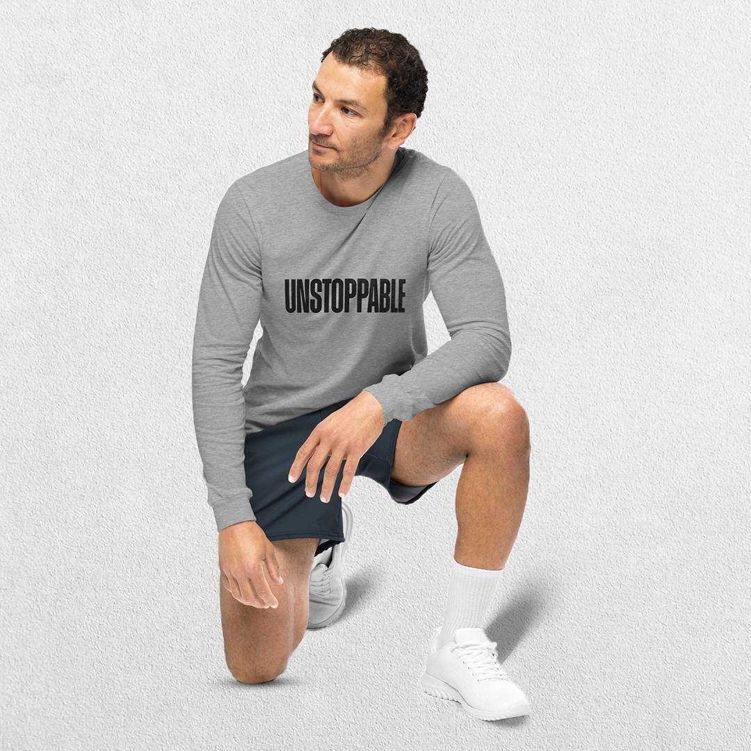 Model Wearing Athletic Heather Men's Gym Long Sleeve Tee – Unmatched Performance & Style in a studio background