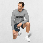 Model Wearing Athletic Heather Men's Gym Long Sleeve Tee – Unmatched Performance & Style in a studio background