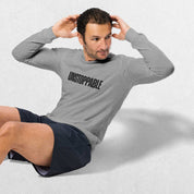 Model Wearing Athletic Heather Men's Gym Long Sleeve Tee – Unmatched Performance & Style in a studio background
