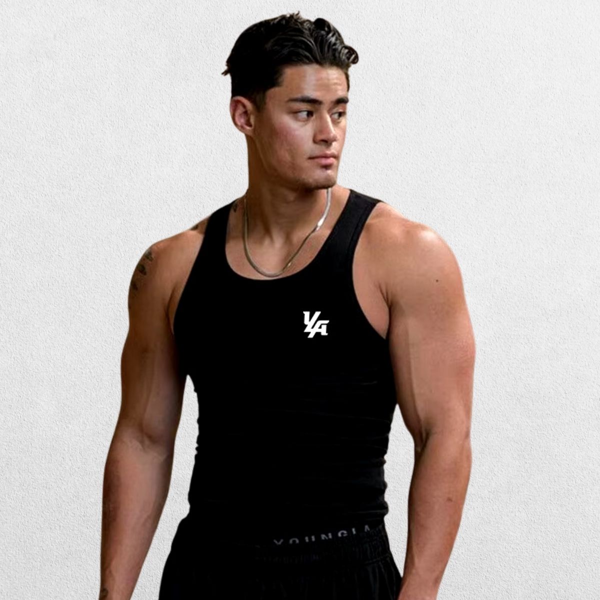 Men’s Slim-Fit Ribbed Muscle Vest in black, emphasizing the modern ribbed texture and moisture-wicking ice silk material for intense workouts.
