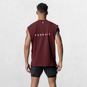 Back view of GPW Men's Performance Round Neck Sleeveless Shirt in burgundy, showing the shirt's silhouette and smooth fabric, set against a minimalistic studio background."