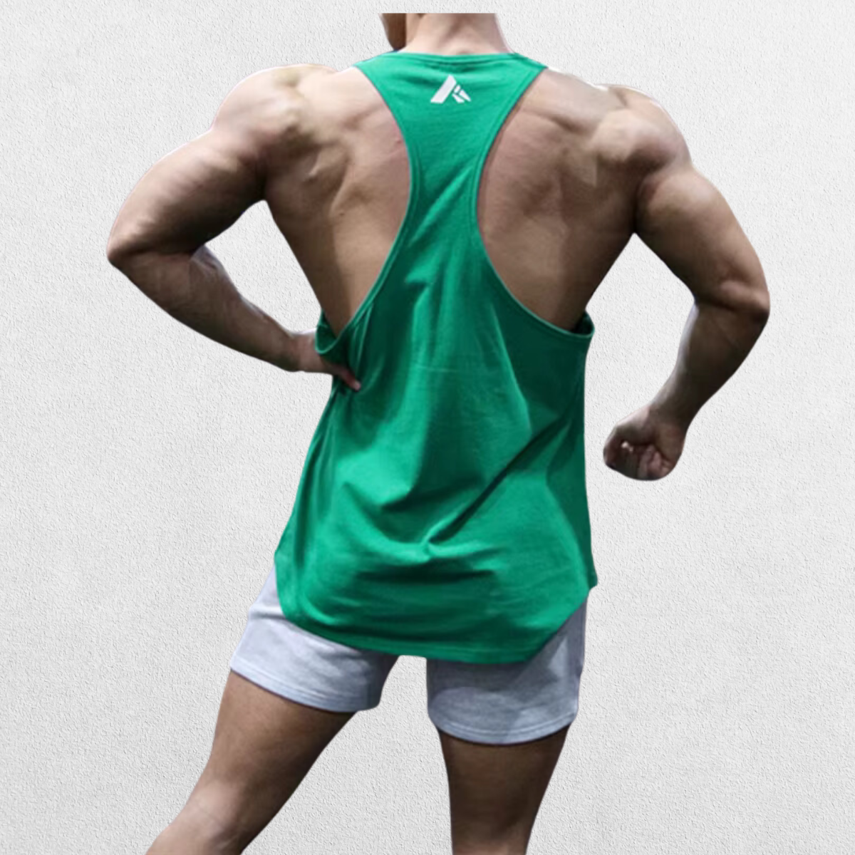 Back view of the GPW Athletic Gym Tank for Men in green, featuring a racerback design for enhanced movement against a plain studio background.