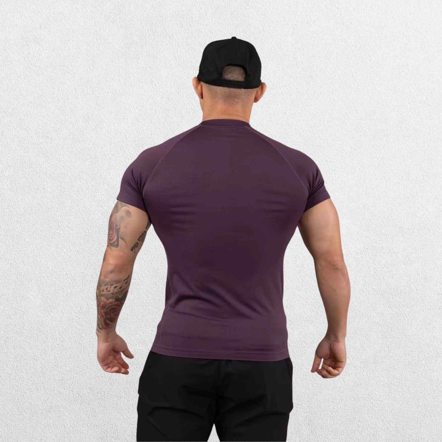 Back view of the GPW High-Performance Quick-Dry Sports T-Shirt in purple, featuring reinforced stitching and a performance-driven fit against a plain studio background.