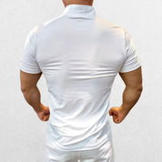 Back view of the GPW Men's High-Performance Short Sleeve Training Shirt in white, showcasing the ergonomic cut and breathable construction against a minimal studio background.