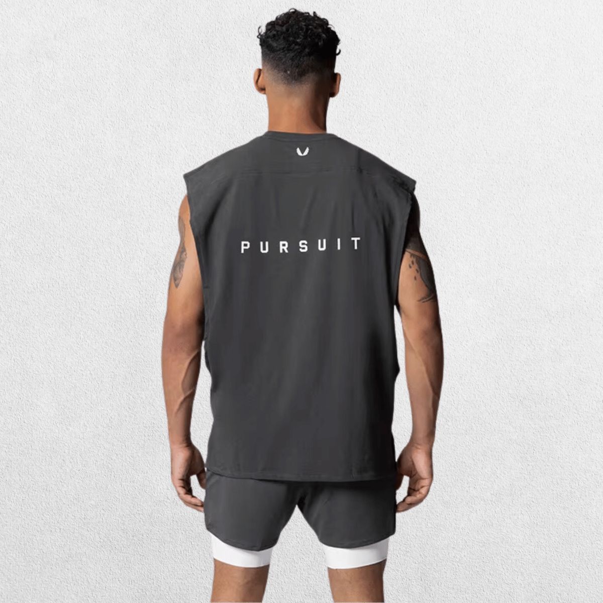 Back view of the GPW Men's Performance Round Neck Sleeveless Shirt in grey, emphasizing the shirt's back design with a studio backdrop.