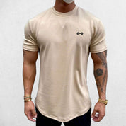 Close-up of Beige GPW Men's Fit Summer Gym T-Shirt - Bodybuilding Streetwear Tee in a studio background