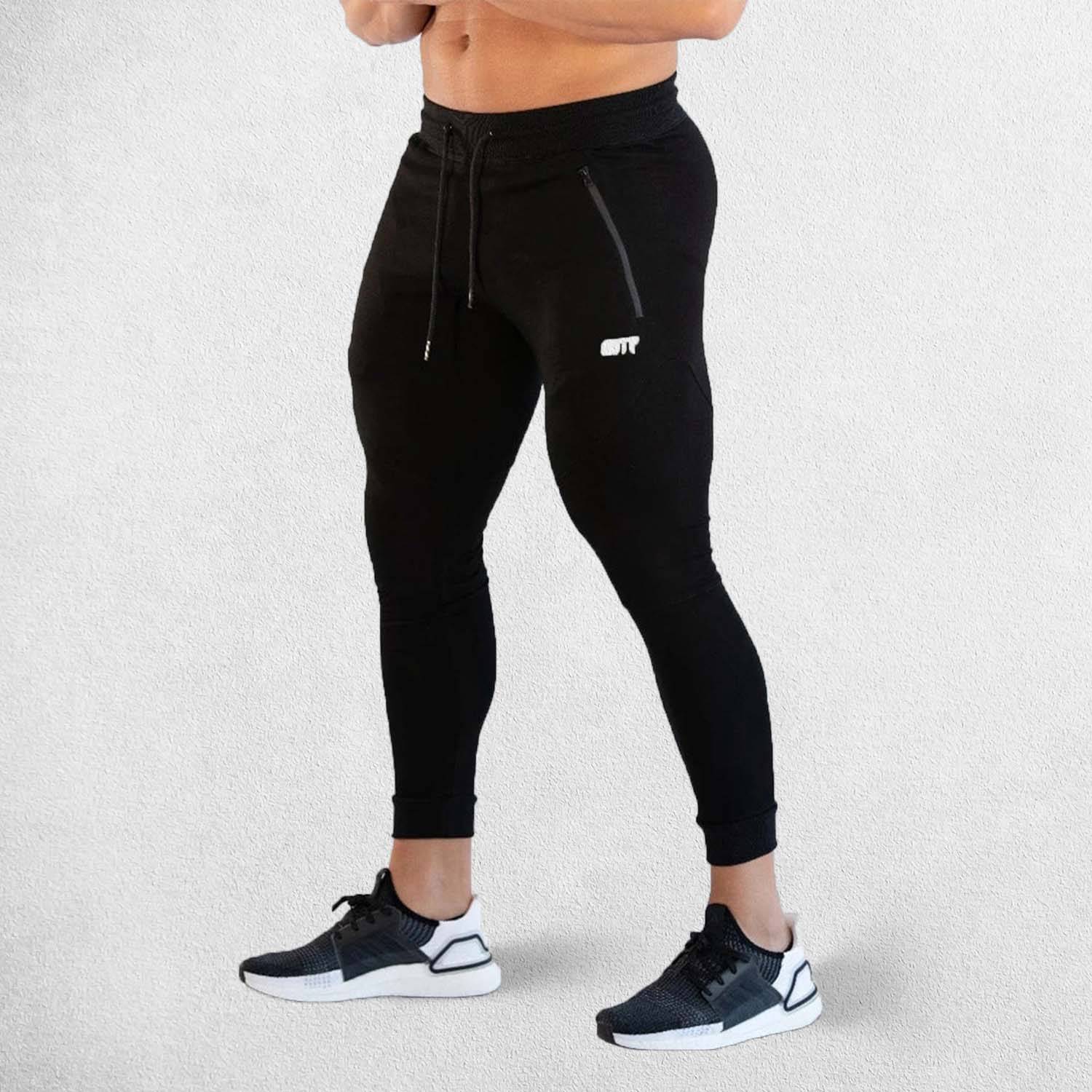 Model Wearing Black Breathable Men’s Training Joggers with Adjustable Drawstring and Secure Pockets