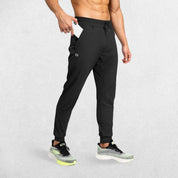 Black GPW Men's Athletic Sweatpants featuring zipper pockets, athletic fit, and sleek design.