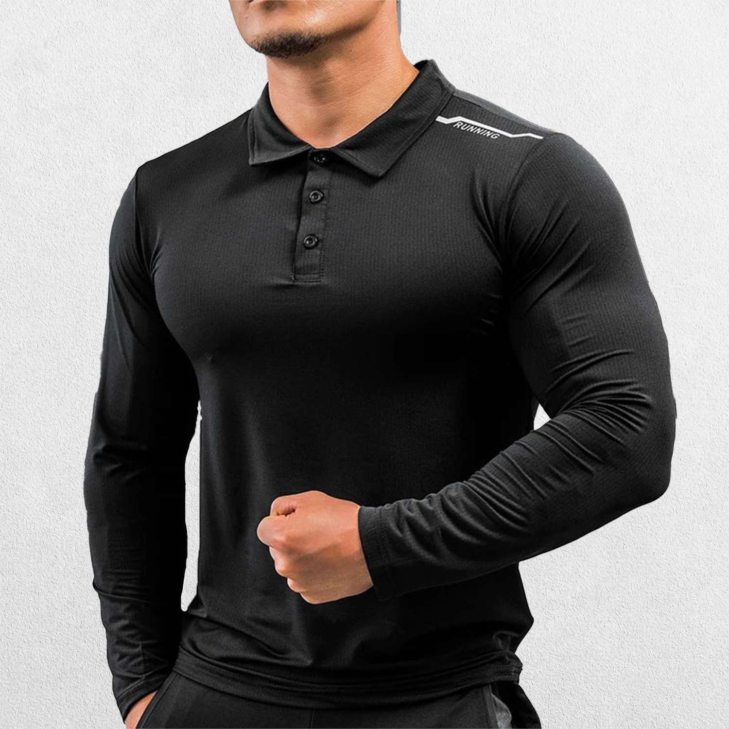 Close-up of Black GPW Men's Compression Shirt - Long Sleeve Rashguard for Fitness in a studio background