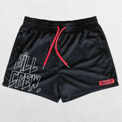 Close-up of Black bold Kill Crew graphic print on GPW gym shorts.