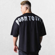 Close-up of Black GPW Men's Oversized Cotton T-Shirt - Casual Gym Fitness Tee