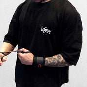 Close-up of Black GPW Men's Oversized T-Shirt - Casual Gym Bodybuilding Top