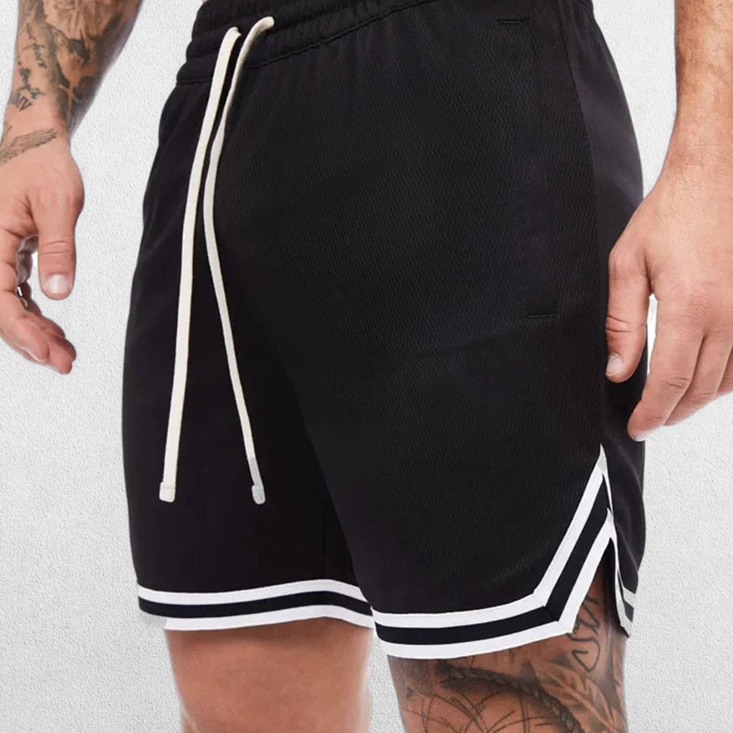 Close-up of Black GPW Men's Quick-Dry Gym Shorts - Summer Fitness and Sportswear in a studio background