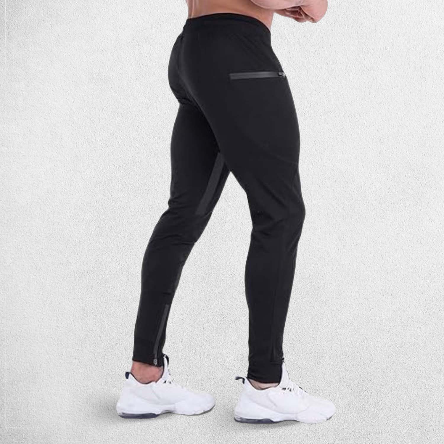 Back view of Model wearing Black GPW Men's Slim Fit Trousers with Zipper Pockets for Training