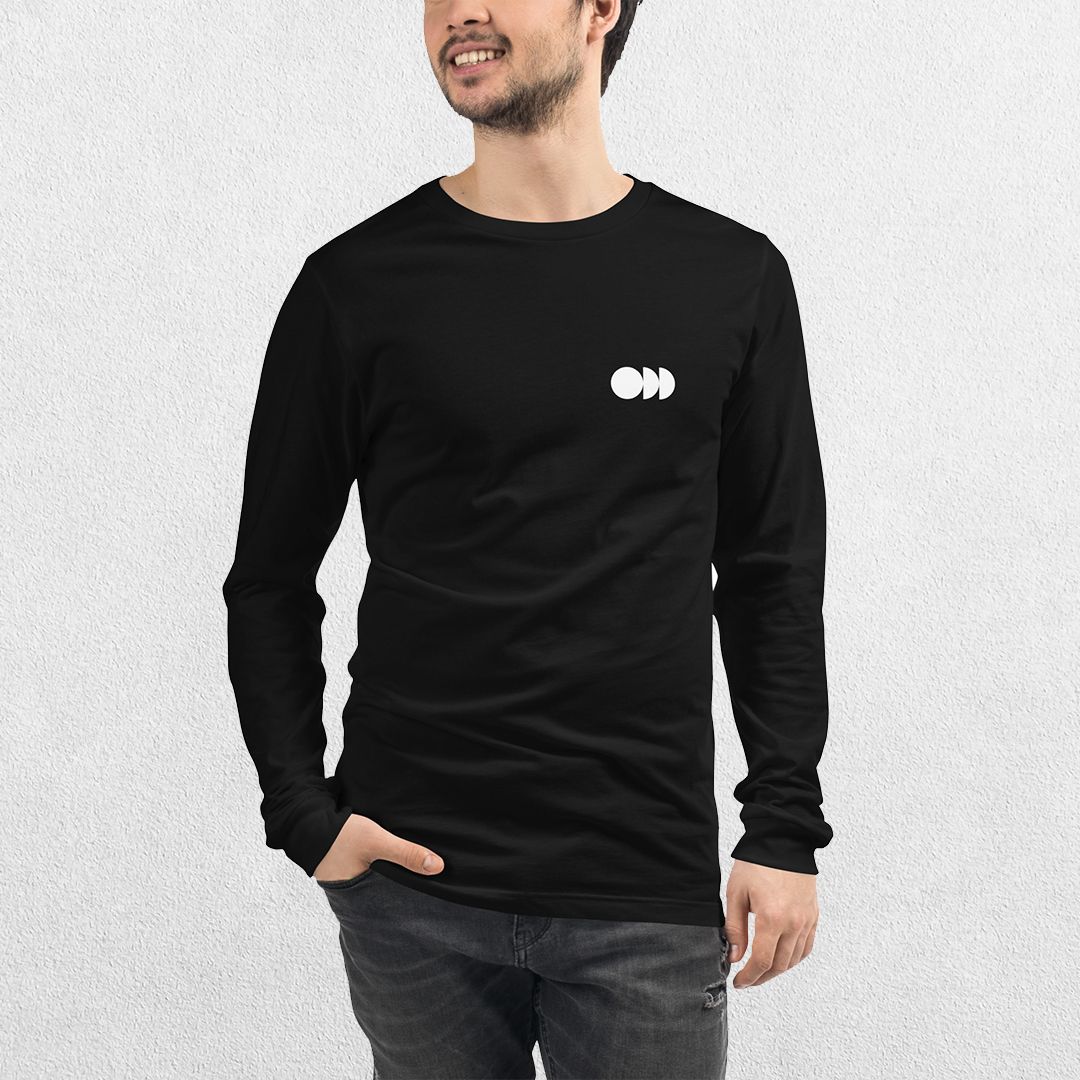 Model wearing the Black GPW Long Sleeve Tee paired with jeans in a Studio Background.