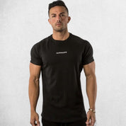 Front View of Model Wearing Black Gym Cotton T-Shirt for Men – Slim Fit, Short Sleeve, Workout & Bodybuilding Tee