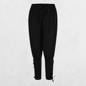Front view of Black loose-fit Viking Navigator Pants with lace-up calf design.
