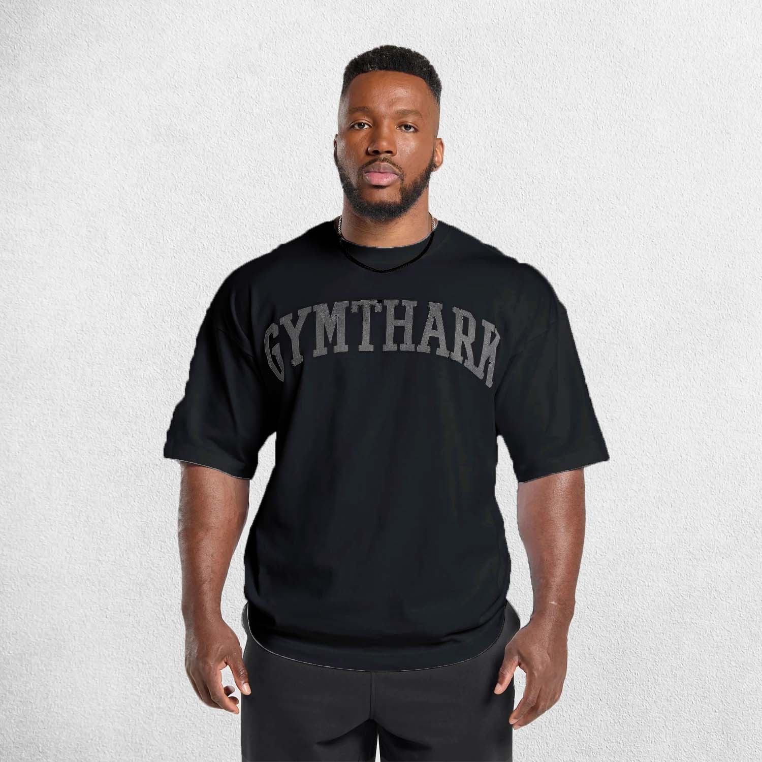 Front View of Model Wearing Black Loose Fit Oversized Gym Tee – Heavyweight Cotton, Premium Comfort & Strength
