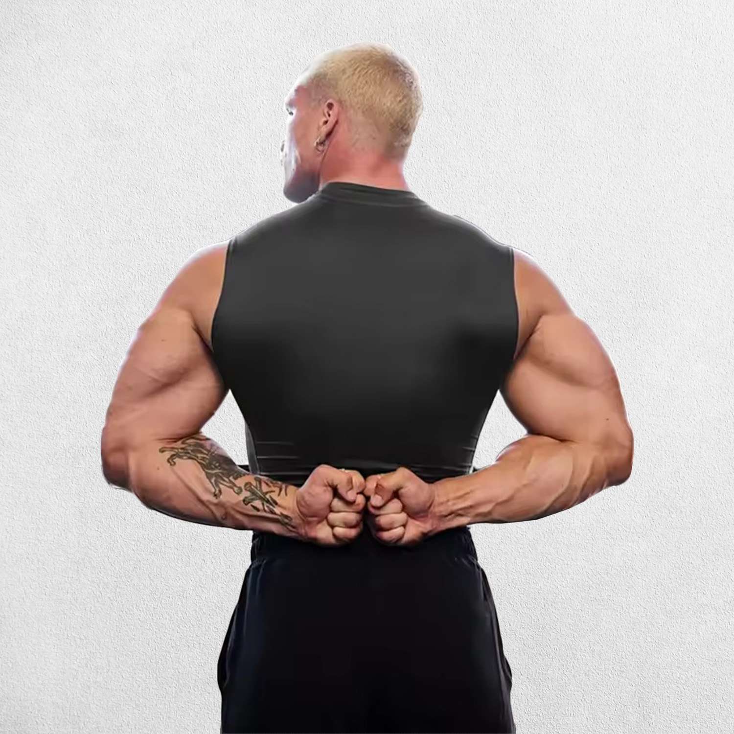 Back view of Men’s Compression Cut-Off Tank Top highlighting ergonomic cut and PWX FLEX fabric for flexibility and movement.