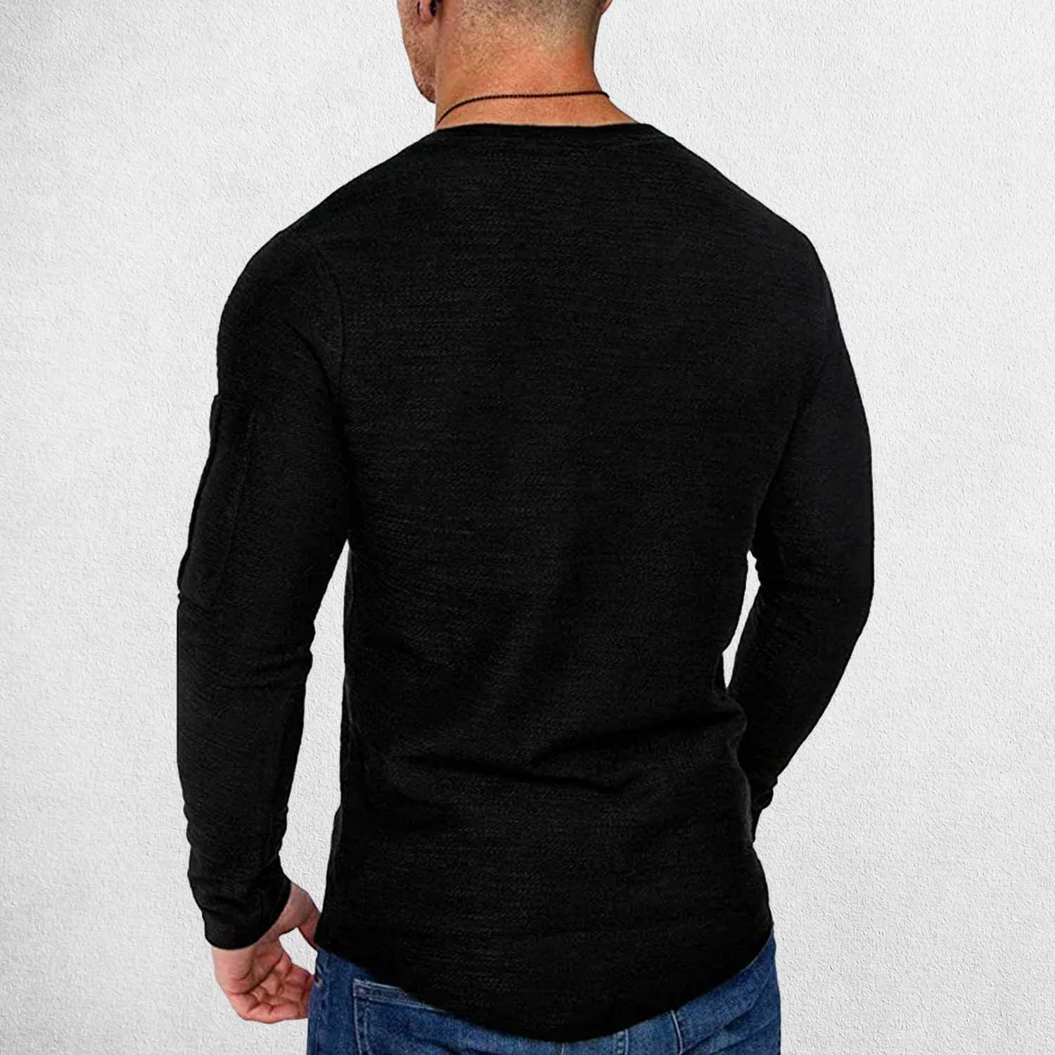 Back view of model wearing Men’s cotton long sleeve t-shirt paired with jeans for a modern look