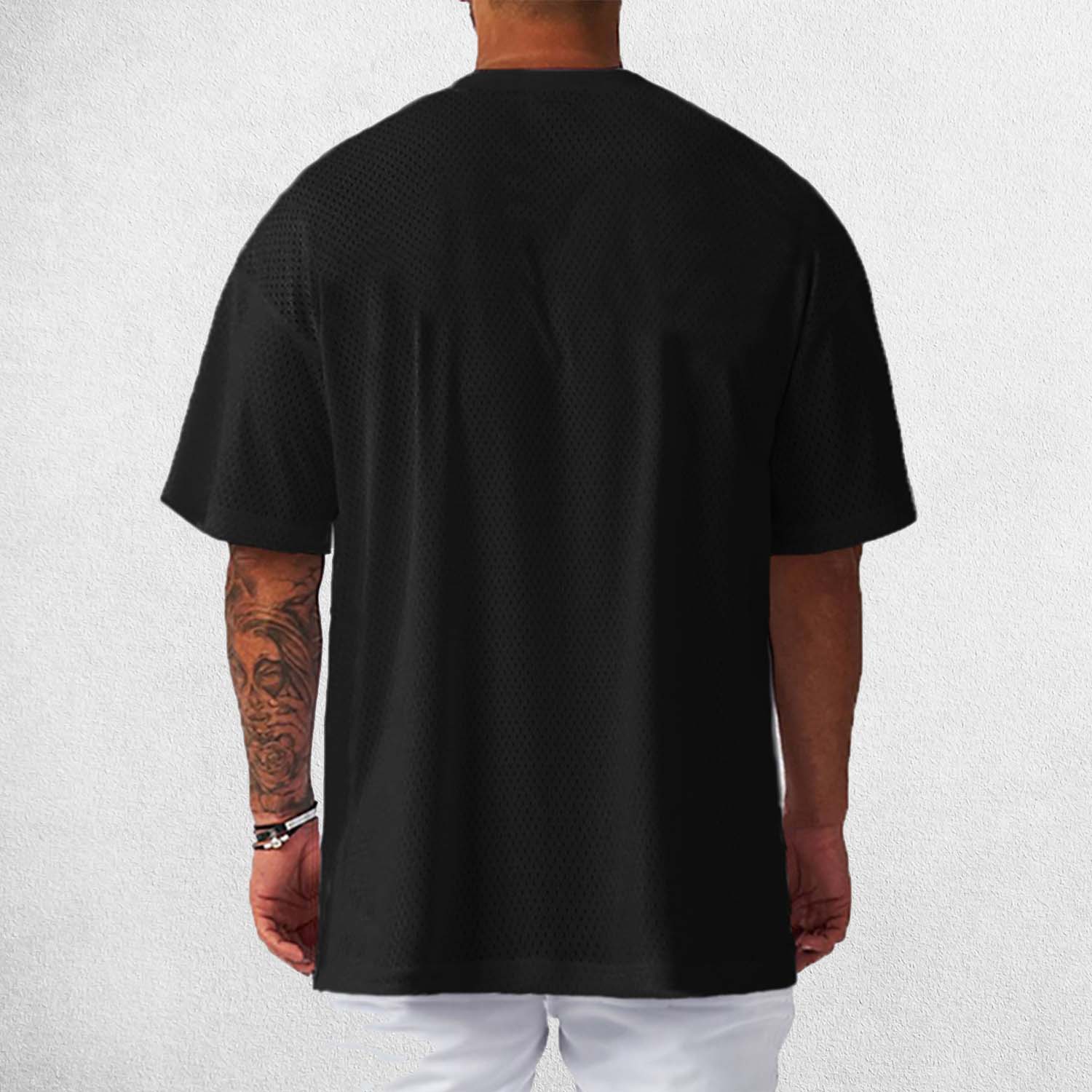 Back View of Model Wearing Black Men's Oversized Gym T-Shirt – Breathable, Quick-Drying & Lightweight Training Tee