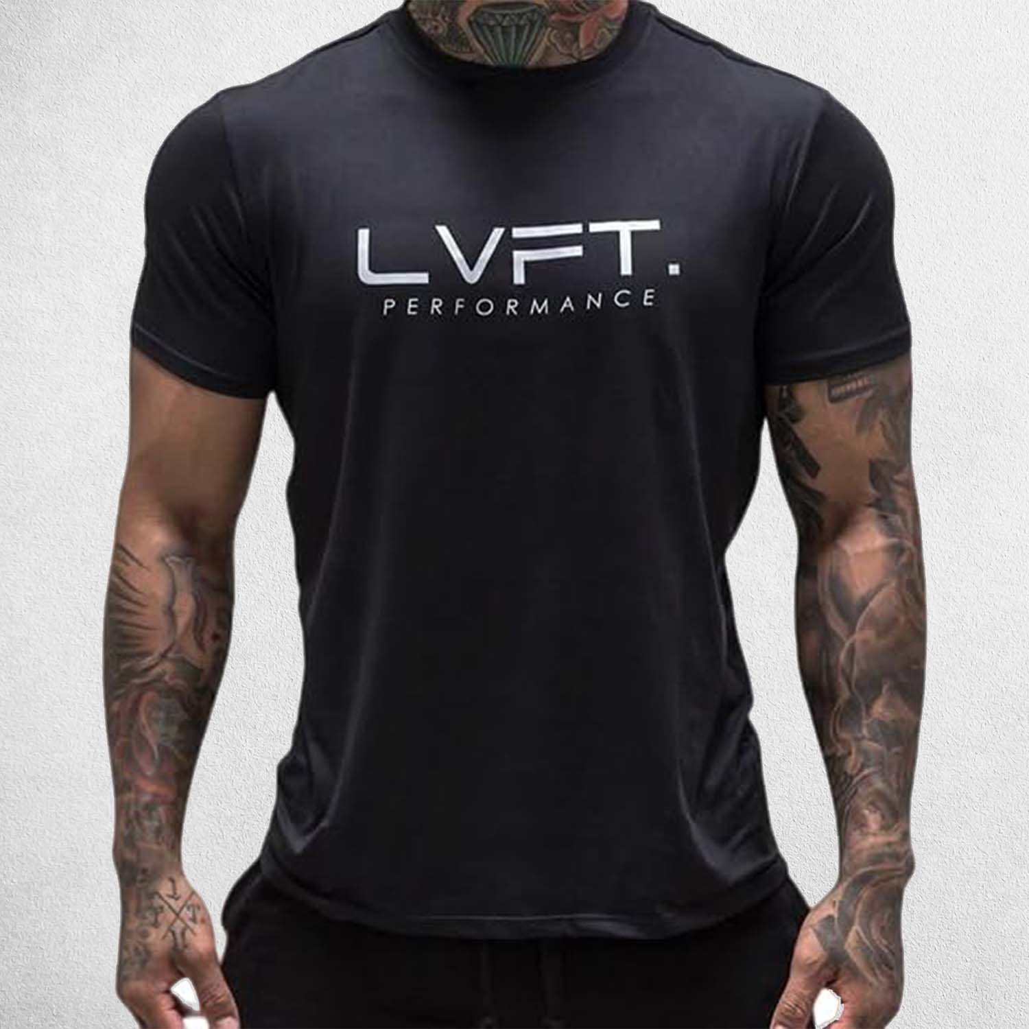 Model wearing Black Men’s Quick-Dry Running T-Shirt – Breathable & Lightweight Sportswear for Fitness & Training