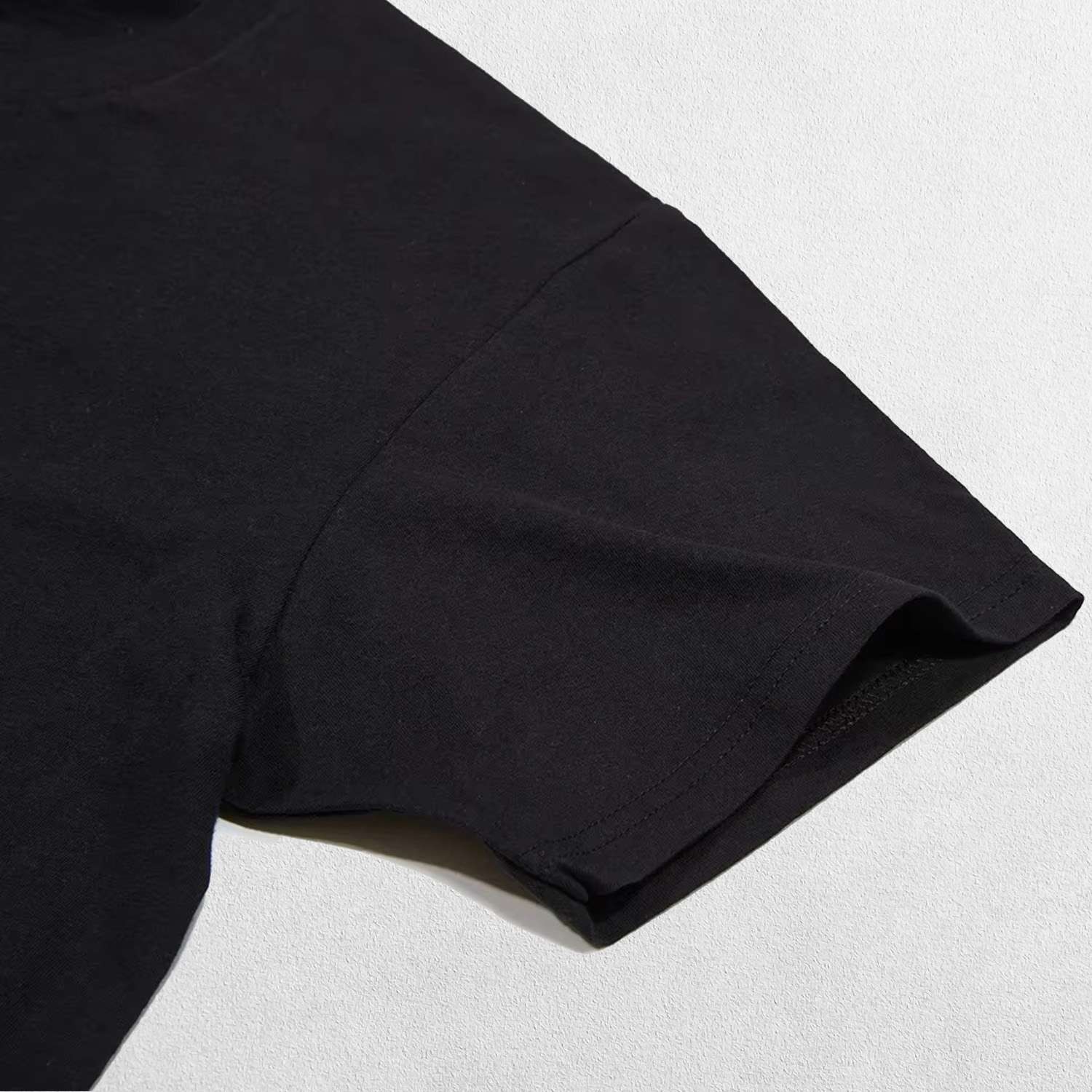 Close up of Black Fabric texture of high-quality polyester material for gym wear.