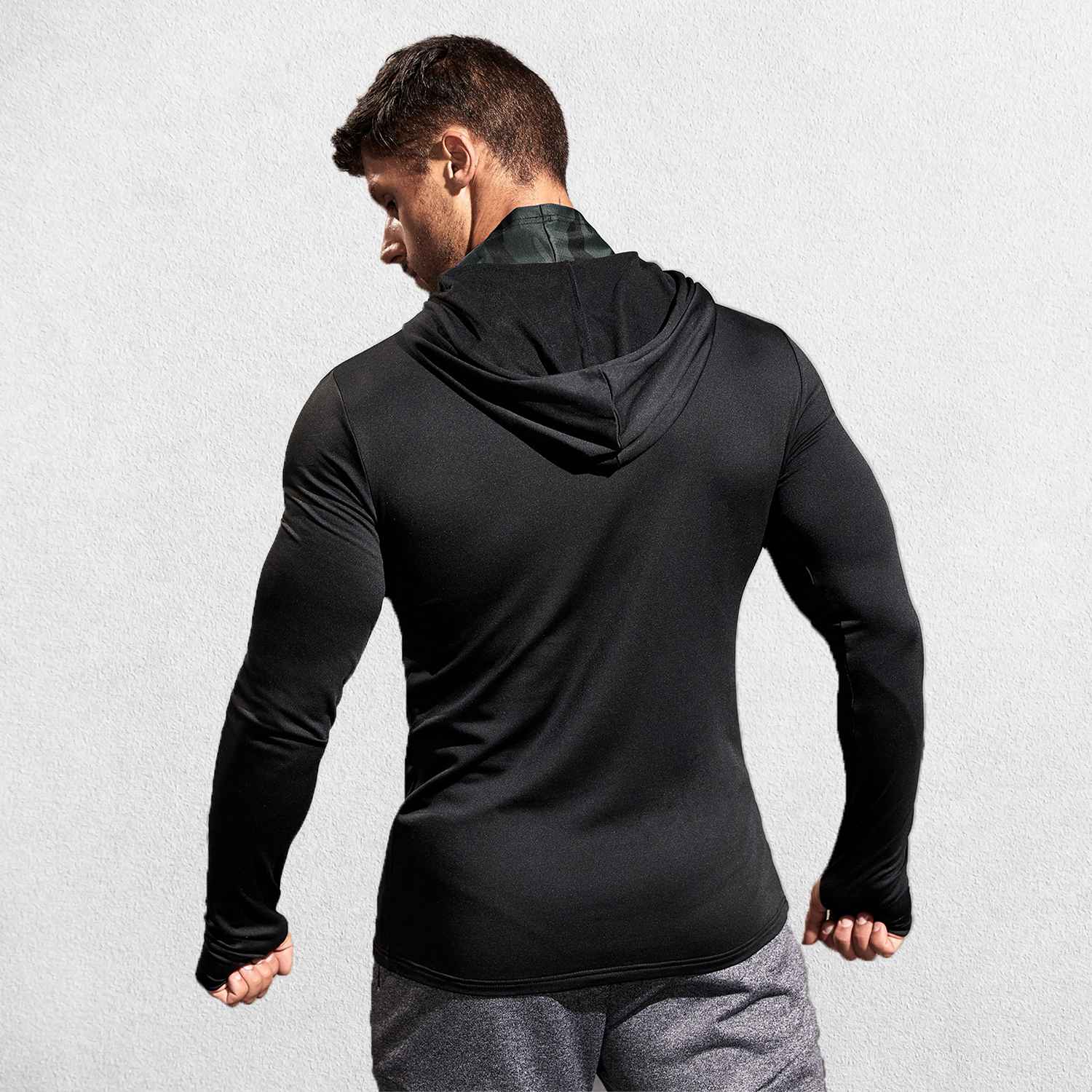 Back of Model wearing Black Men’s Sun Protection Hooded Shirt - UV-Resistant Outdoor Activewear