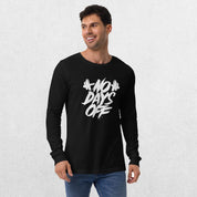 Model wearing the Black No Days Off Unisex Long Sleeve Tee - Versatile Athletic and Casual Wear with jeans in studio background.