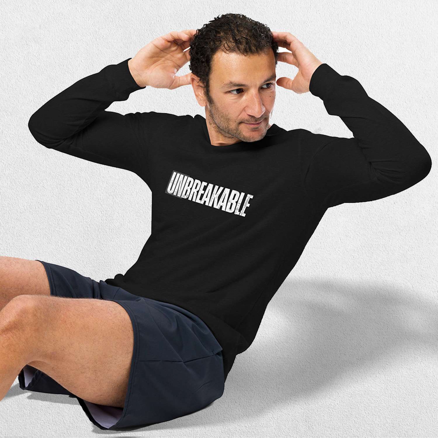 Model wearing the Athletic Heather Unbreakable Printed Unisex Long Sleeve Tee – Durable and Versatile Style