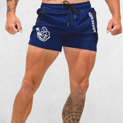 Model wearing Blue GPW Men’s Quick-Dry Running Shorts - Gym, Bodybuilding, Beachwear