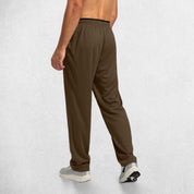 Back View of Model Wearing Brown GPW Men’s Open-Bottom Workout Trousers with Lightweight Mesh