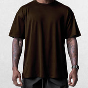 Close-up of Brown GPW Men's Summer Quick-Dry Gym Casual Tee in a studio background
