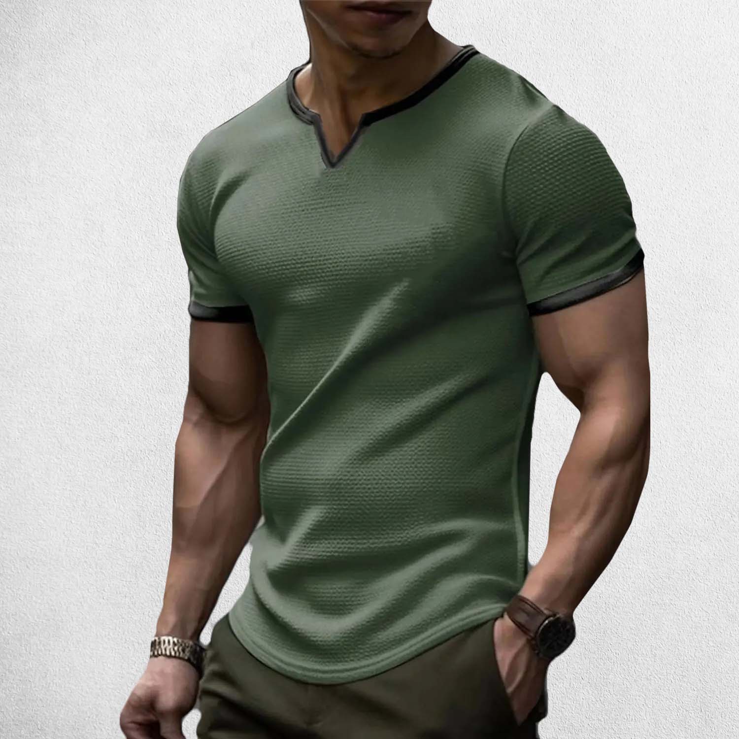 Model Wearing Dark Green Men’s Casual Slim Fit V-Neck Waffle Solid Color Short Sleeve T-Shirt for Summer in a studio background