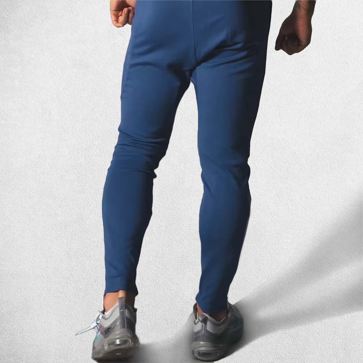 Back View of Model Wearing Dark BLue Men’s Fitness Workout Cotton Skinny Joggers for Running, Fitness & Bodybuilding