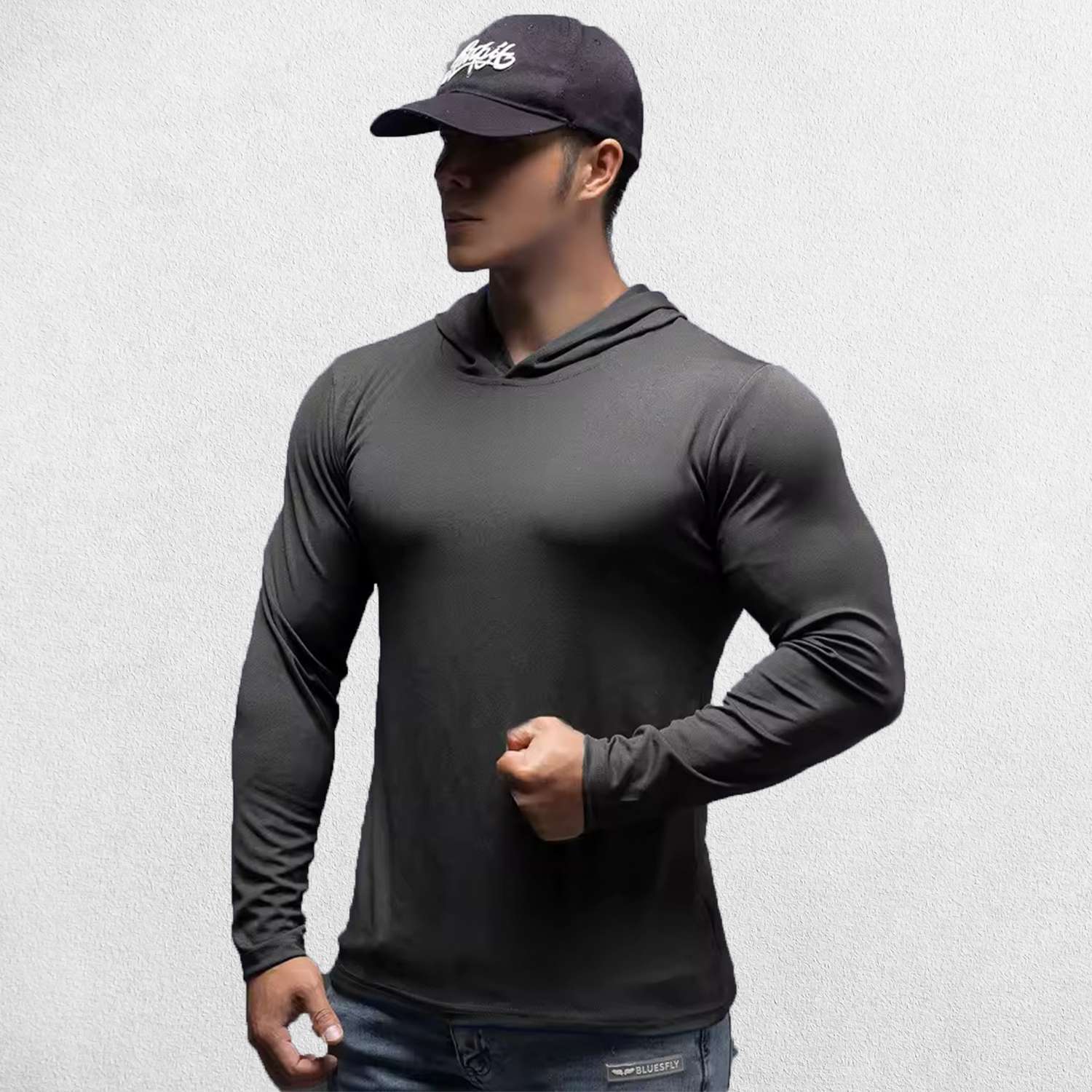 Model wearing Dark Grey Athletic Fit Fitness Hoodie Top For Running, Bodybuilding, and Fitness