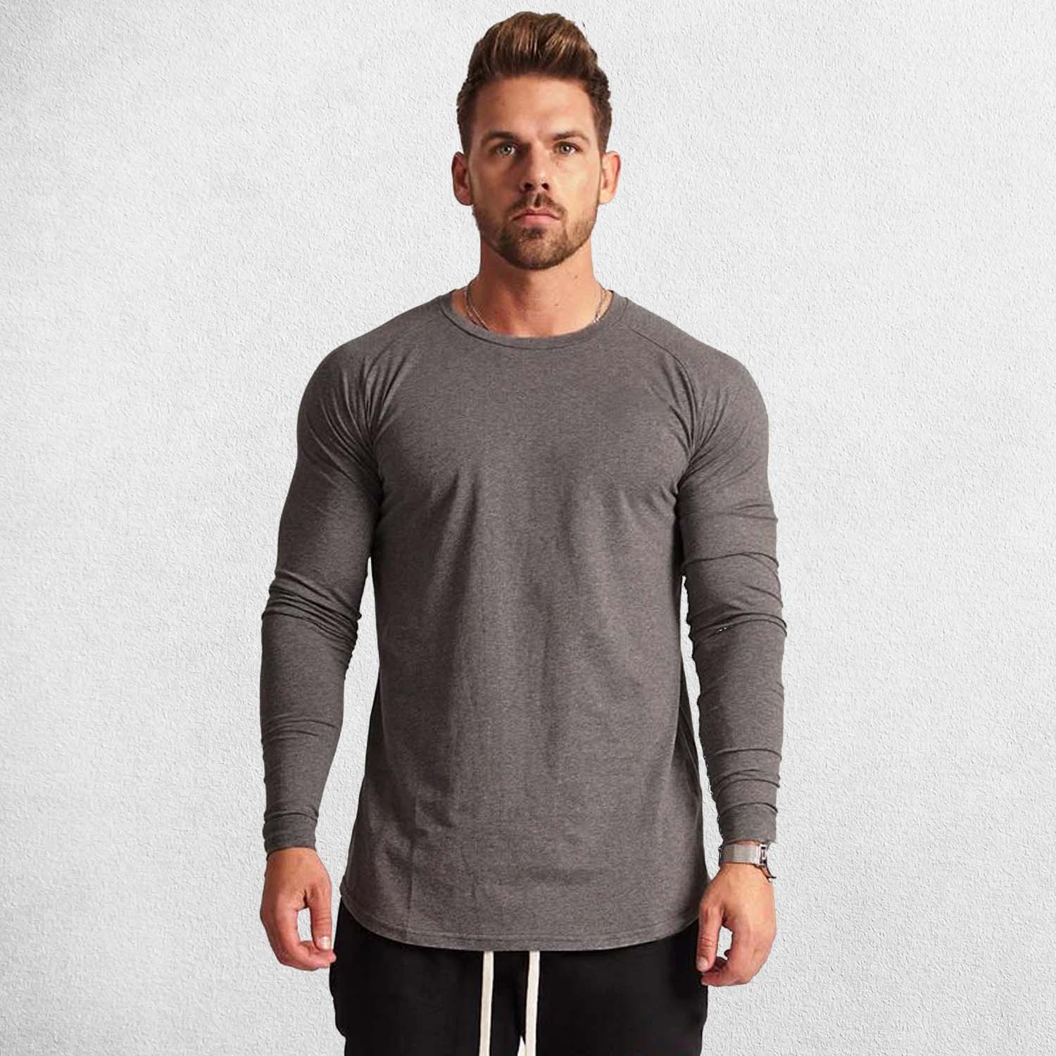 Model Wearing Dark Grey Men’s Slim Fit Cotton Fitness Long Sleeve T-Shirt – Front view showcasing O-neck design and letter pattern for casual and gym wear.