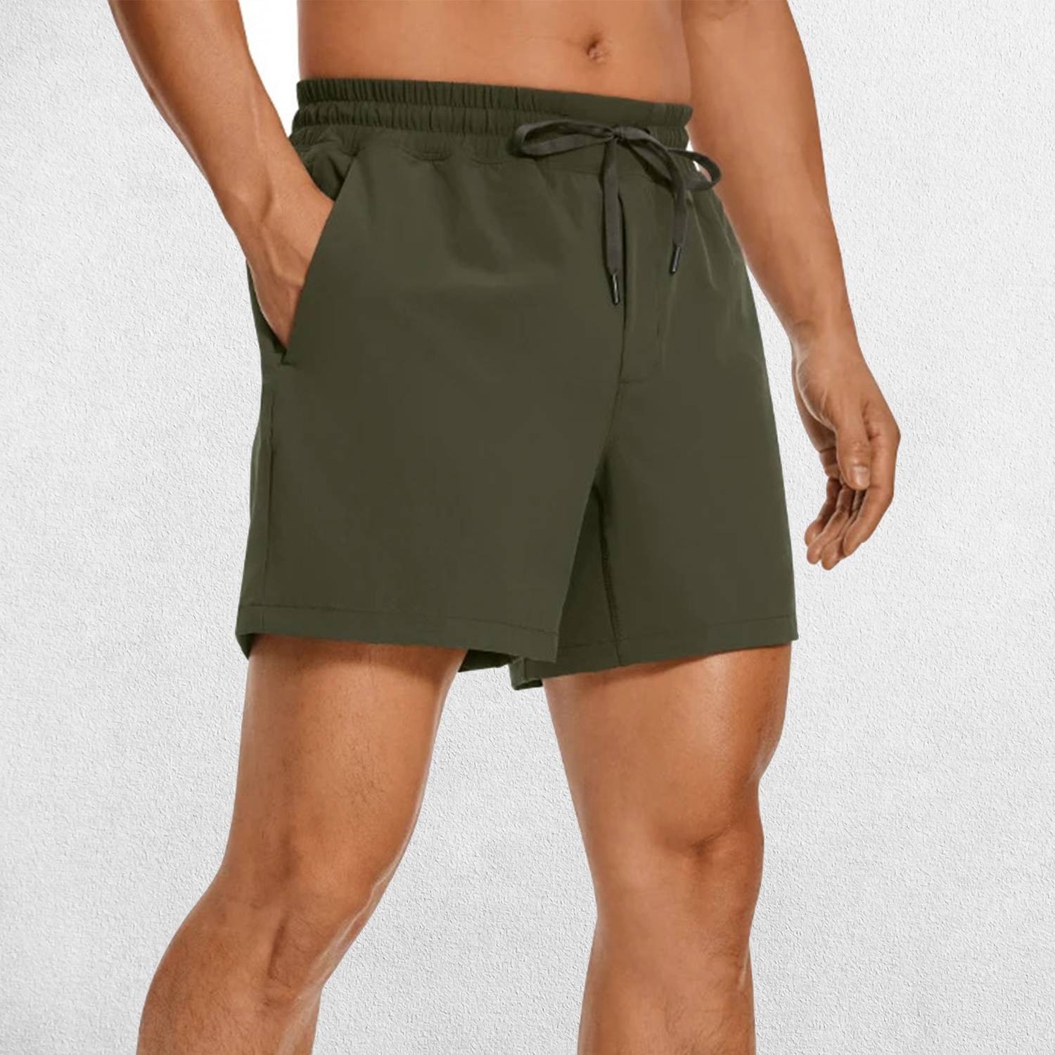 Front Close-up of Dark Olive Green GPW Men's Lightweight Quick-Dry Workout Shorts with Pockets in a studio background