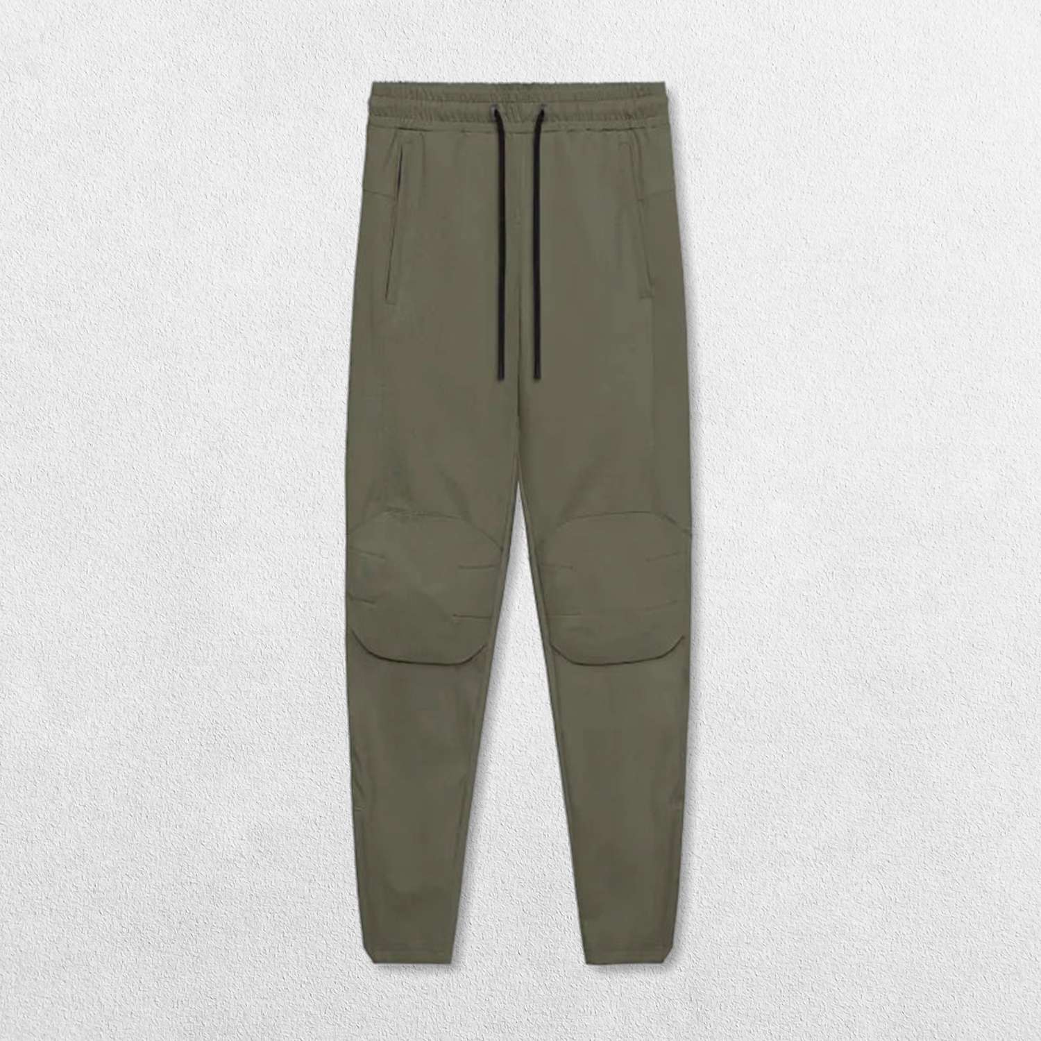 Full-length shot of Dark Olive Green pants styled for both gym and casual wear.