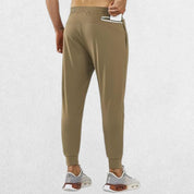 Men's lightweight brown trousers with secure zipper pocket
