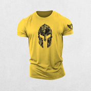 Close-up of Yellow 3D Spartan helmet design on hex camo gym t-shirt