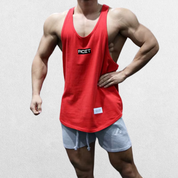 GPW Athletic Gym Tank for Men in red, front view displaying the bold color and form-fitting design against a simple studio backdrop.