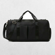 Black GPW Gym Bag with external quick-access pockets.