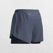 GPW High-Performance Men’s Running Shorts in dark grey, front view highlighting the neutral tone, stretchable waistband, and high-performance material against a clean studio backdrop