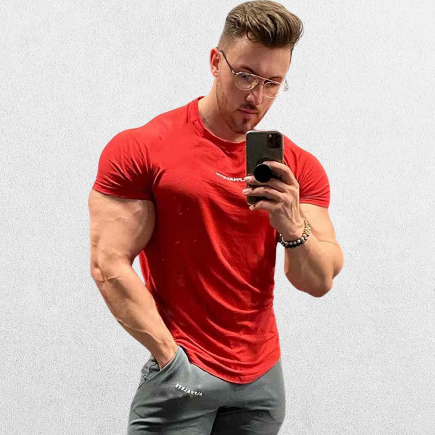 GPW High-Performance Workout T-Shirt in red, front view showcasing the bold color, athletic fit, and moisture-wicking fabric against a clean studio background.