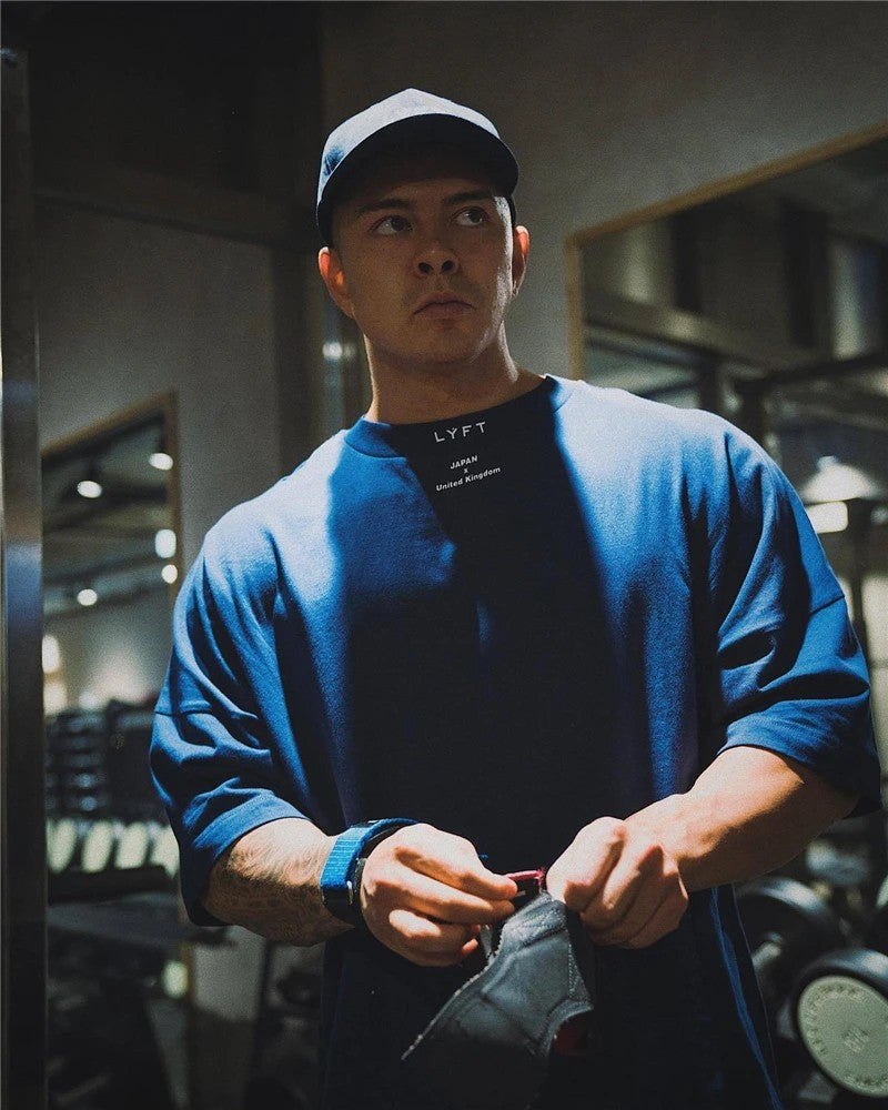 Casual styling of a Dark Blue men’s gym shirt in  GYm background