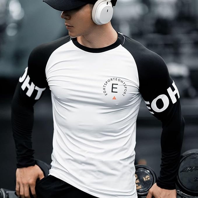 Model wearing white t shirt in gym side profile
