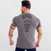 Back view of the GPW Men’s Compression Quick-Dry T-Shirt in dim grey, showcasing the stylish, minimalist design.